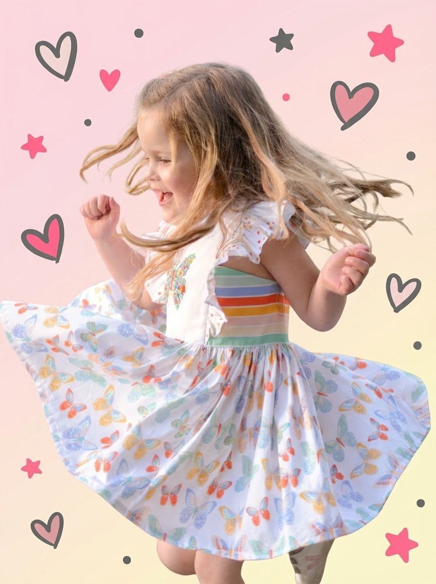 Child wearing a floral dress dancing