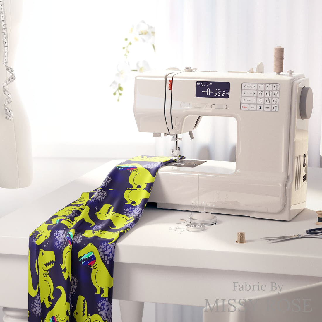 Design 1003 Navy Dinosaur Fabric on a sewing machine – premium fabric for sewing projects | Fabric by Missy Rose