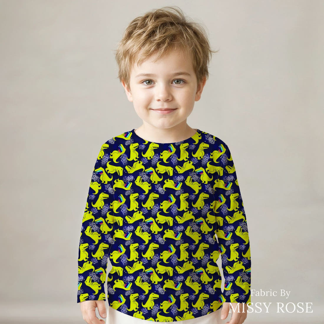 Design 1003 Navy Dinosaur Fabric sewn into a kids' long sleeve top – see how the print looks made up | Fabric by Missy Rose