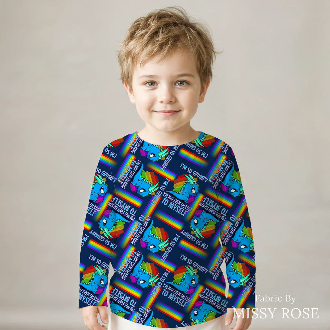 Design 104 Grumpy Dragon Fabric sewn into a kids' long sleeve top – see how the print looks made up | Fabric by Missy Rose