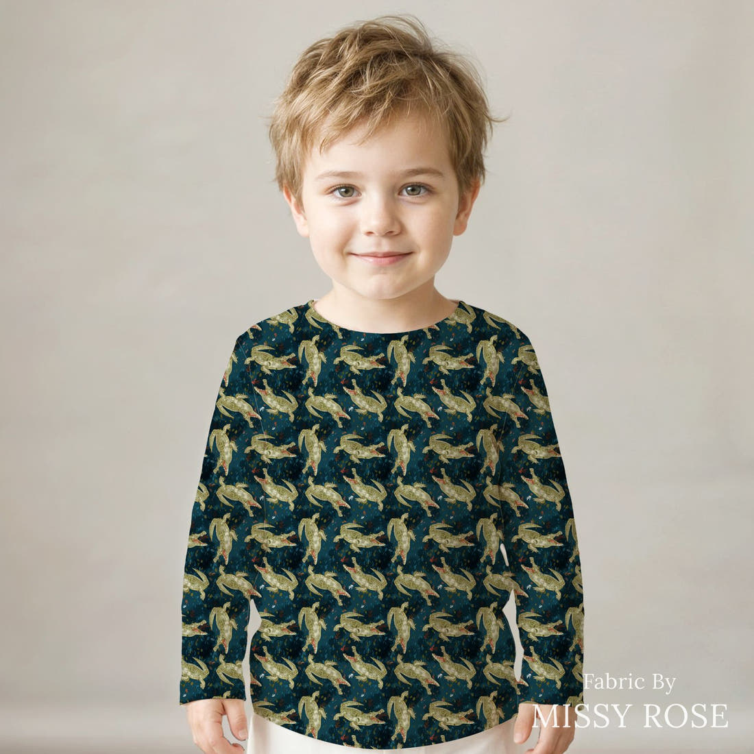 Design 1056 Crocodile Fabric sewn into a kids' long sleeve top – see how the print looks made up | Fabric by Missy Rose