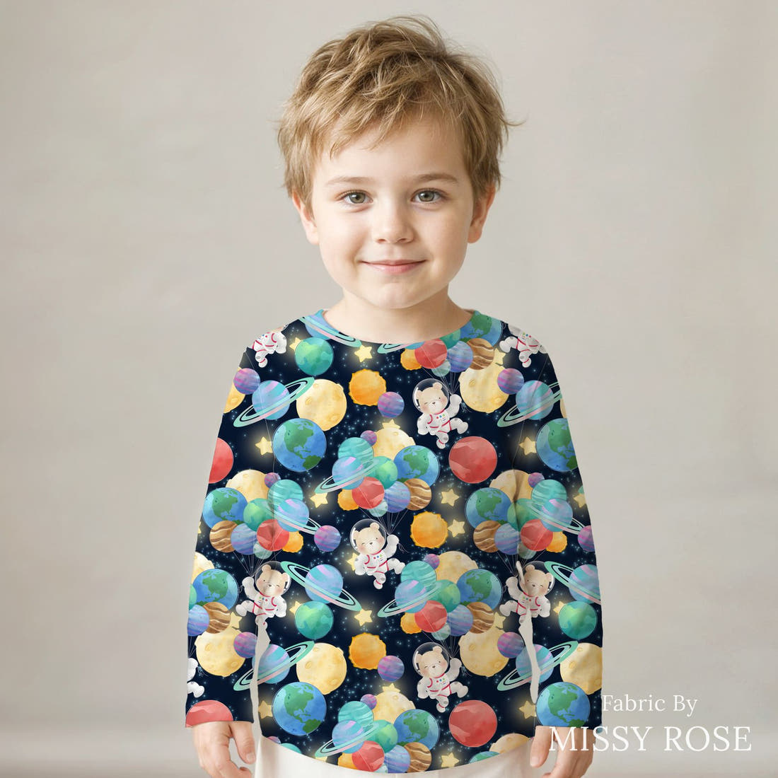 Design 1065 Space Bear Fabric sewn into a kids' long sleeve top – see how the print looks made up | Fabric by Missy Rose