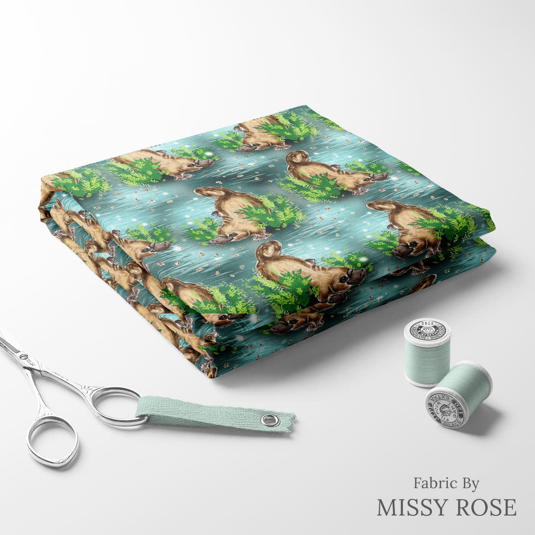 Design 1068 Platypus Fabric folded fabric stack with matching thread – pre-order fabric Australia | Fabric by Missy Rose