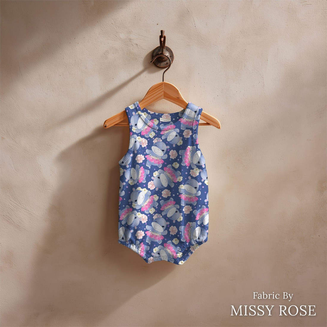 Design 109 Blue Hippopotamus Fabric sewn into a baby romper – see how the print looks made up | Fabric by Missy Rose