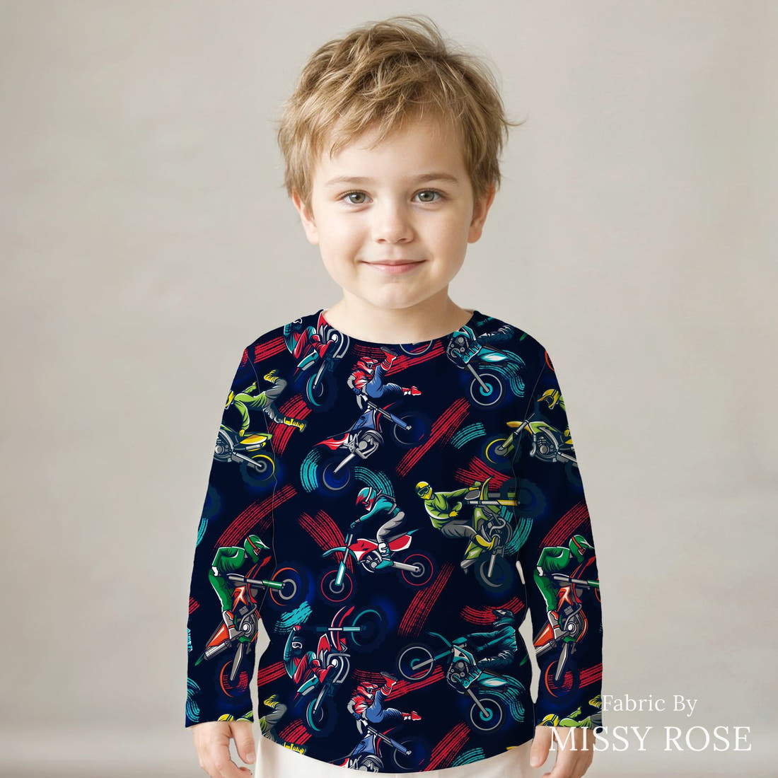 Design 1095 Navy Racer Fabric sewn into a kids' long sleeve top – see how the print looks made up | Fabric by Missy Rose