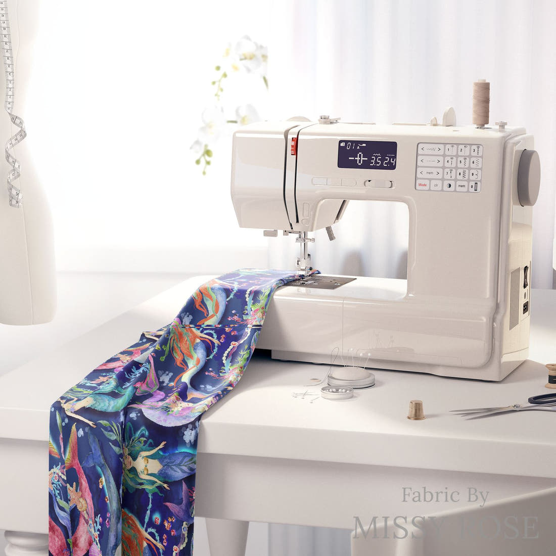 Design 1098 Navy Mermaid Fabric on a sewing machine – premium fabric for sewing projects | Fabric by Missy Rose
