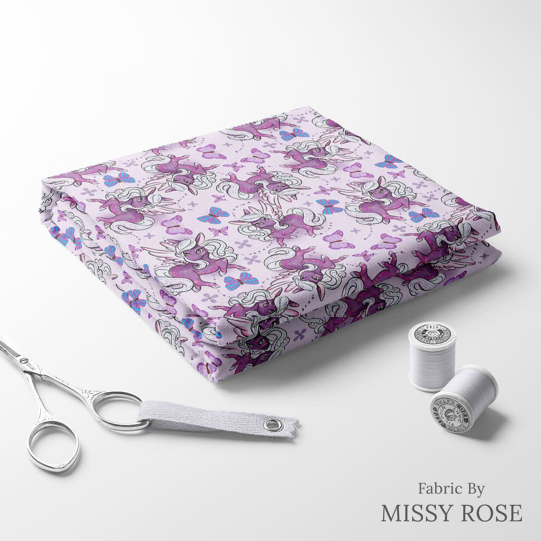 Design 1119 Purple Pegasus Fabric folded fabric stack with matching thread – pre-order fabric Australia | Fabric by Missy Rose