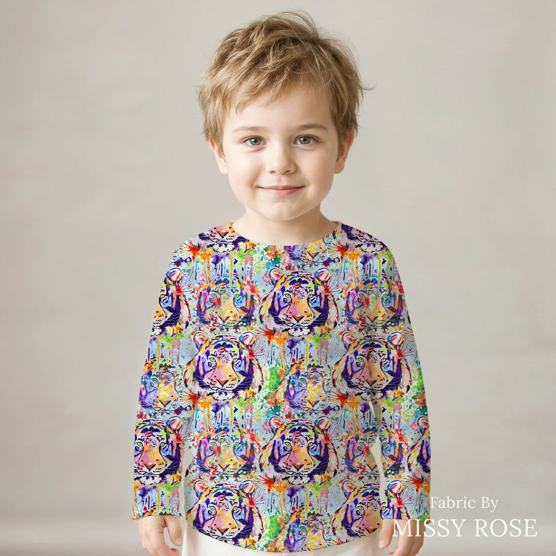 Design 1124 Watercolour Tiger Fabric sewn into a kids' long sleeve top – see how the print looks made up | Fabric by Missy Rose