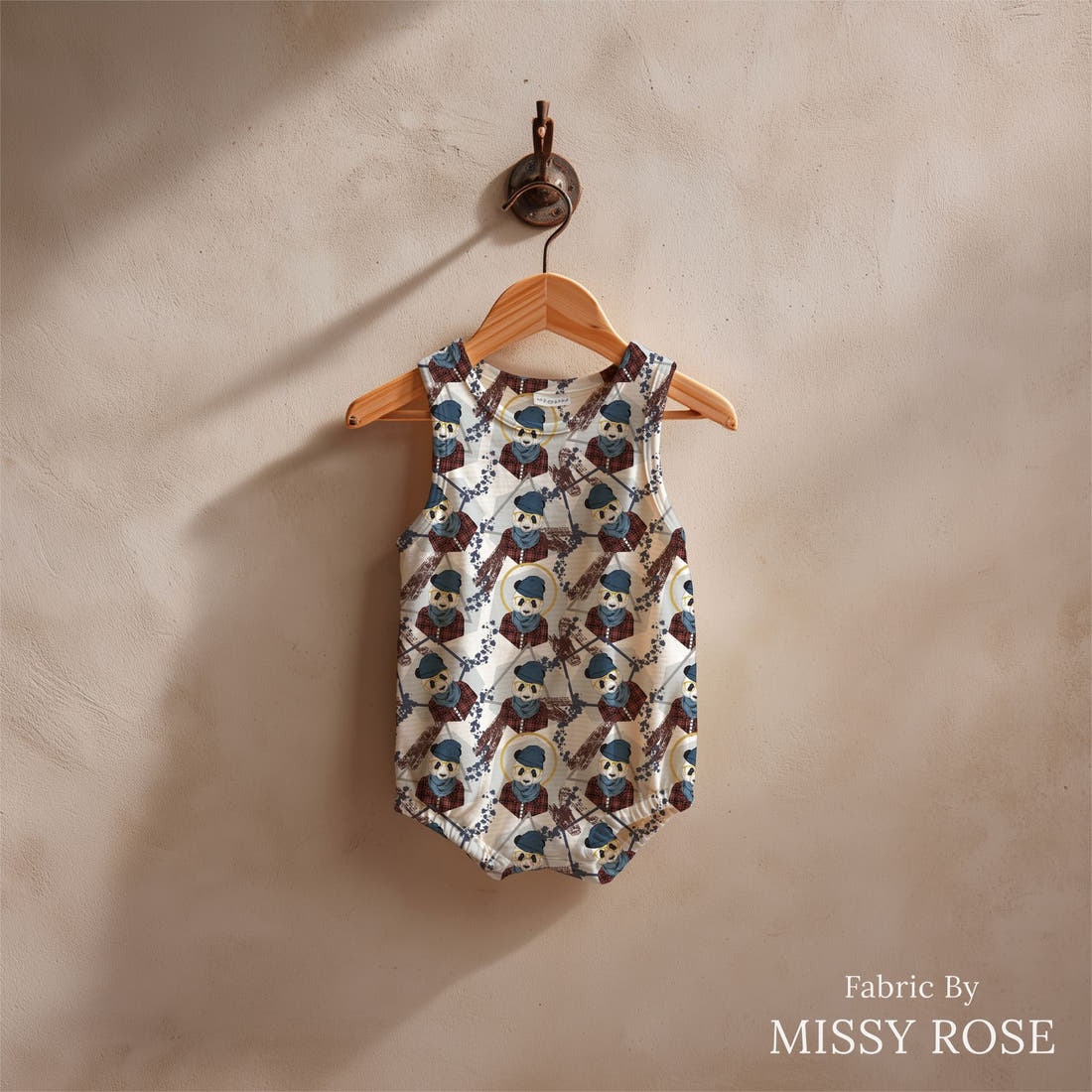 Design 1148 Geometric Panda Fabric sewn into a baby romper – see how the print looks made up | Fabric by Missy Rose