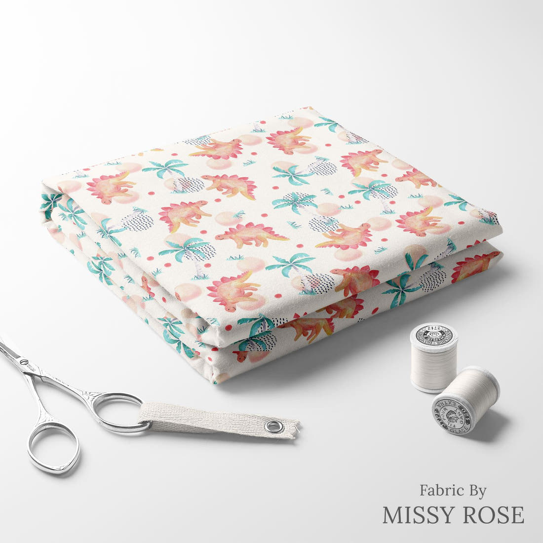 Design 1150 Watercolour Dinosaur Fabric folded fabric stack with matching thread – pre-order fabric Australia | Fabric by Missy Rose