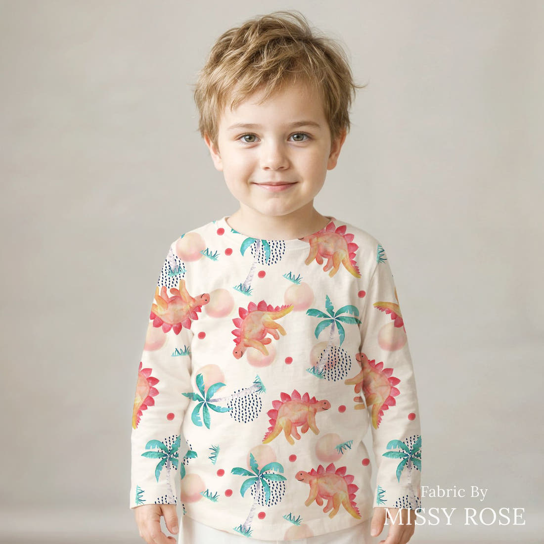 Design 1150 Watercolour Dinosaur Fabric sewn into a kids' long sleeve top – see how the print looks made up | Fabric by Missy Rose