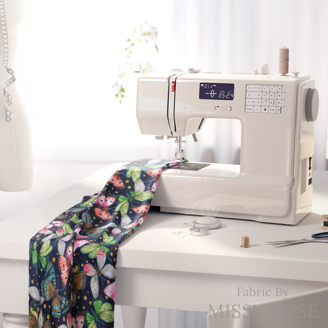 Design 116 Navy Butterfly Fabric on a sewing machine – premium fabric for sewing projects | Fabric by Missy Rose