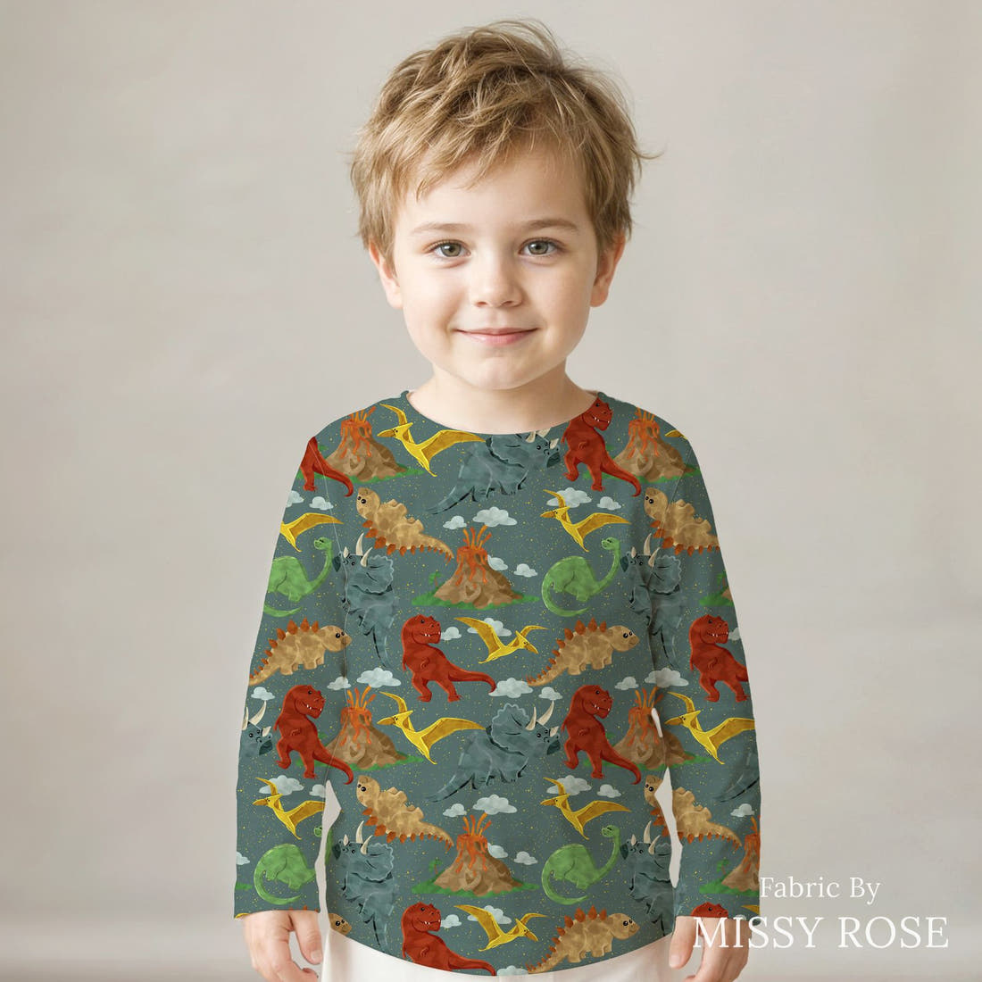 Design 1166 Green Dino Fabric sewn into a kids' long sleeve top – see how the print looks made up | Fabric by Missy Rose