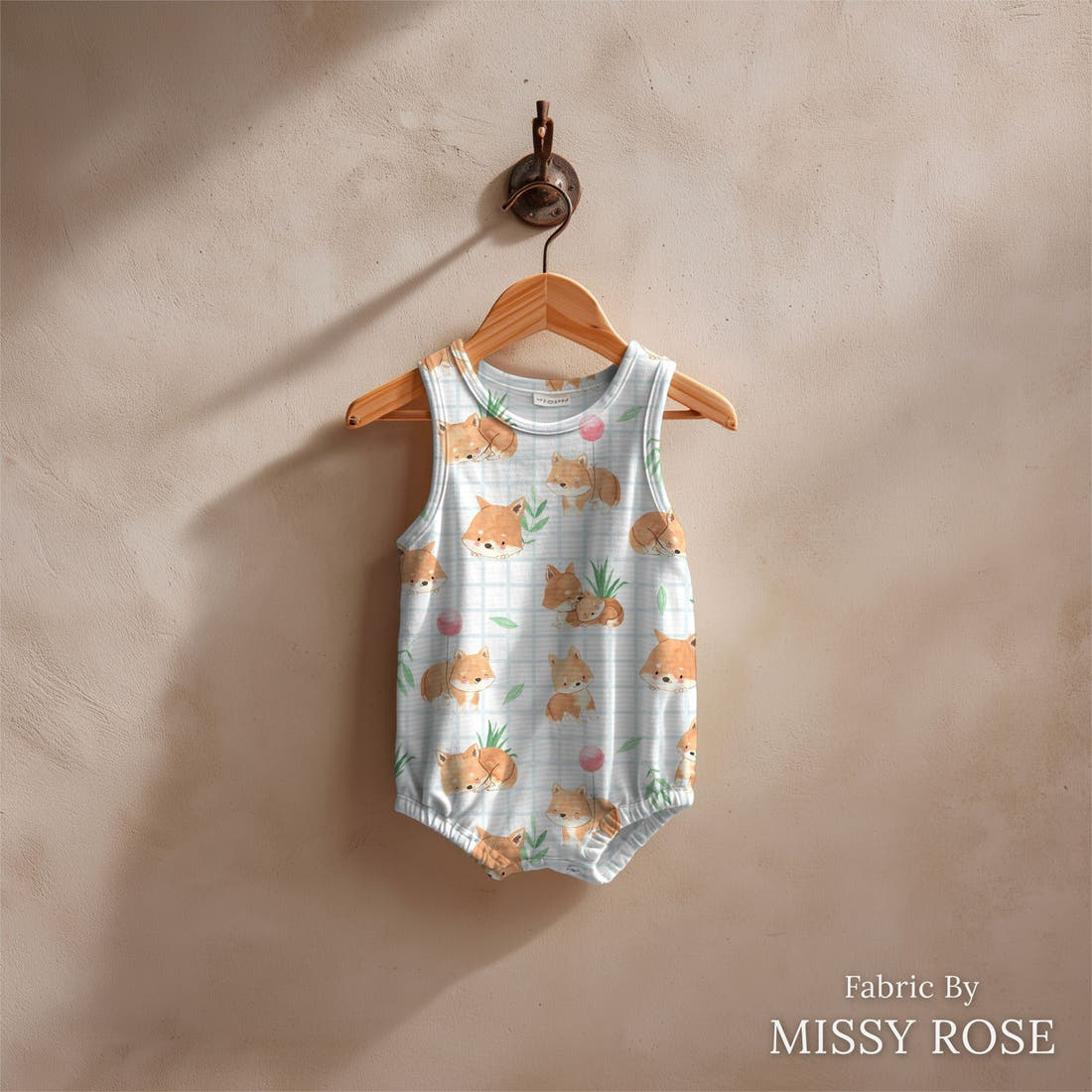 Design 117 Dingo Fabric sewn into a baby romper – see how the print looks made up | Fabric by Missy Rose