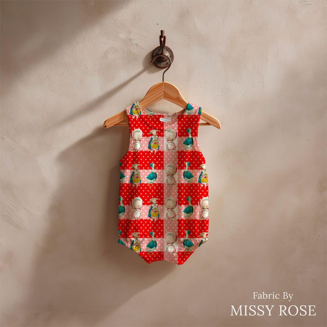 Design 118 Red Farm Animals Fabric sewn into a baby romper – see how the print looks made up | Fabric by Missy Rose