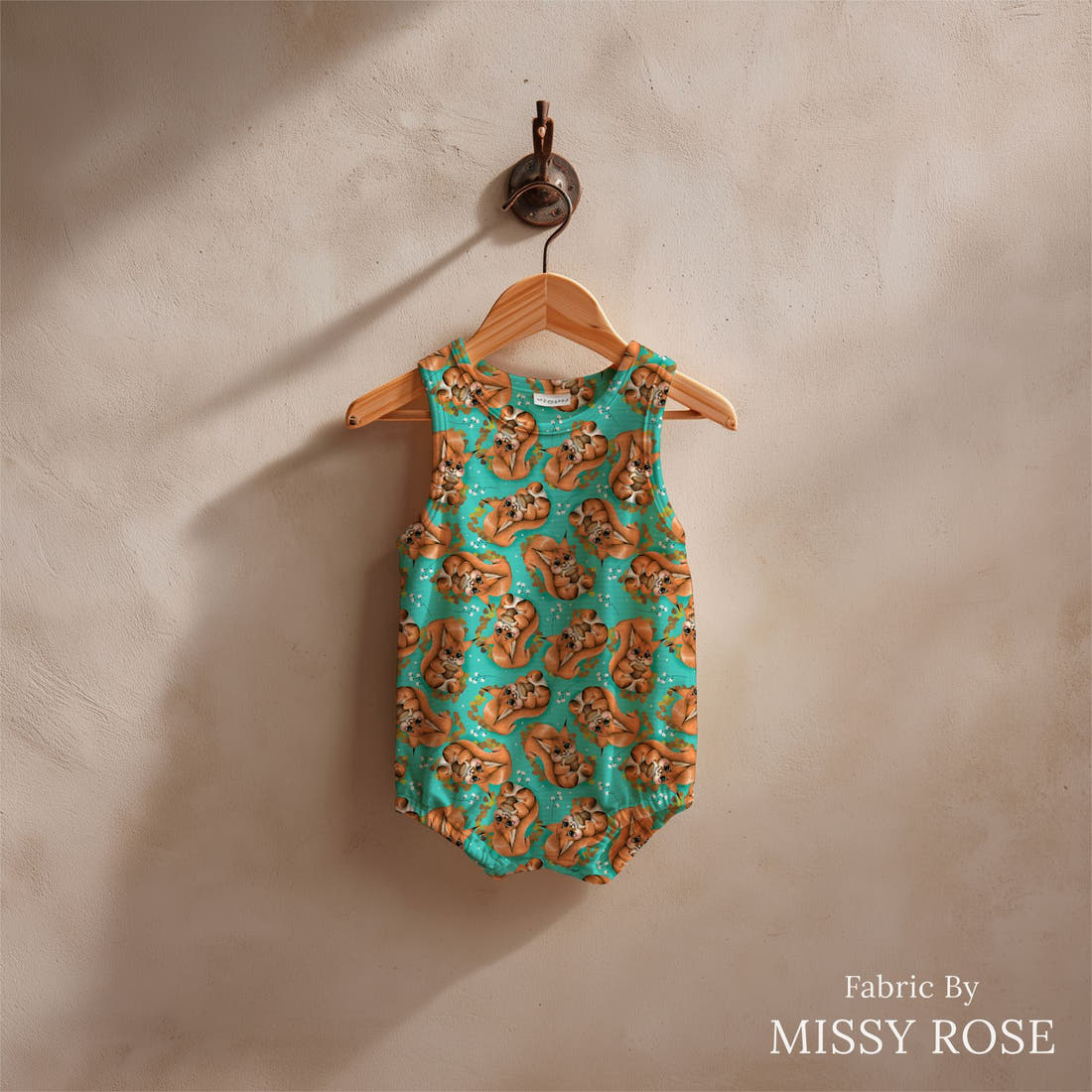 Design 1199 Squirrel Fabric sewn into a baby romper – see how the print looks made up | Fabric by Missy Rose