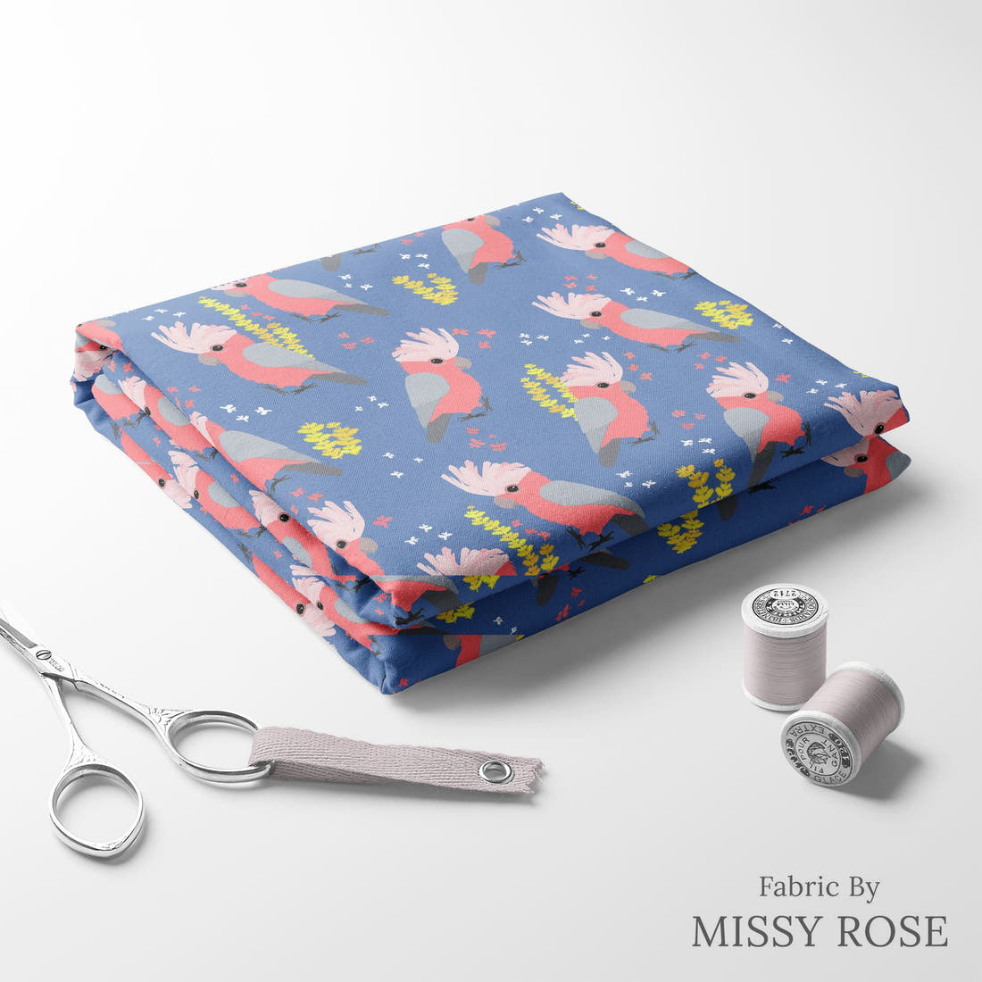 Design 120 Blue Galah Fabric folded fabric stack with matching thread – pre-order fabric Australia | Fabric by Missy Rose