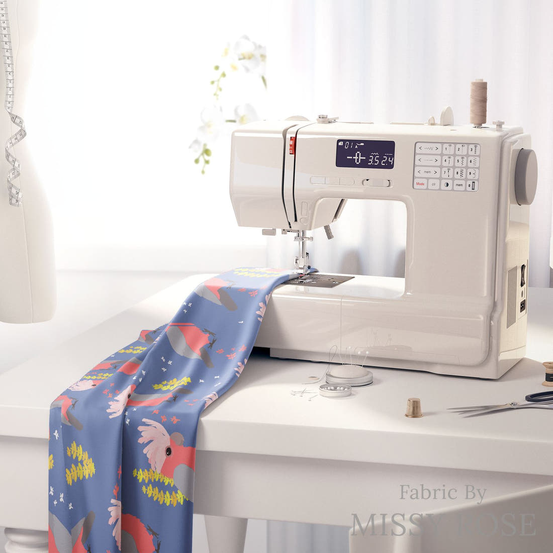 Design 120 Blue Galah Fabric on a sewing machine – premium fabric for sewing projects | Fabric by Missy Rose