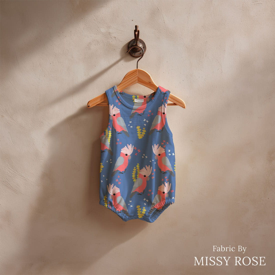 Design 120 Blue Galah Fabric sewn into a baby romper – see how the print looks made up | Fabric by Missy Rose
