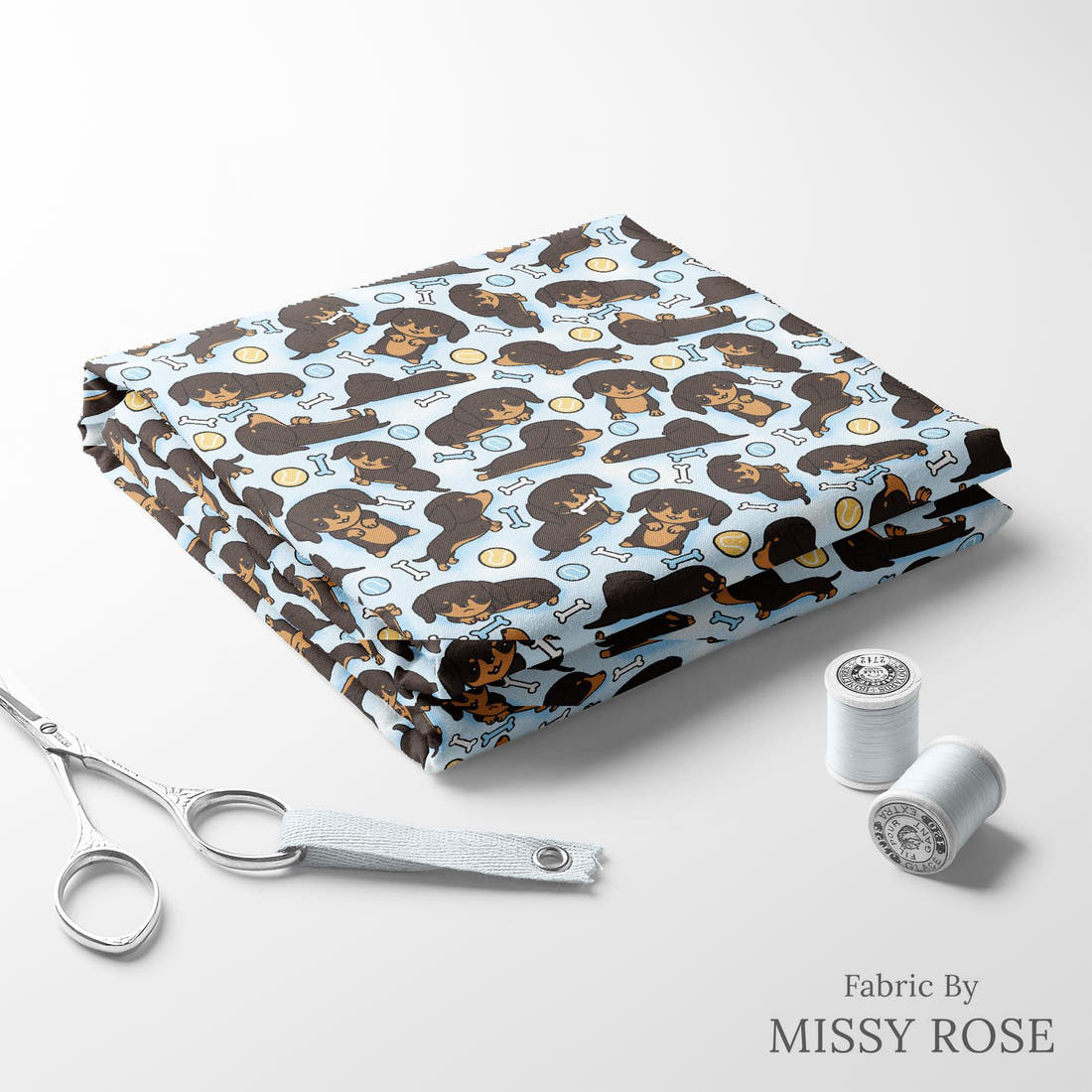 Design 127 Sausage Dog Fabric folded fabric stack with matching thread – pre-order fabric Australia | Fabric by Missy Rose