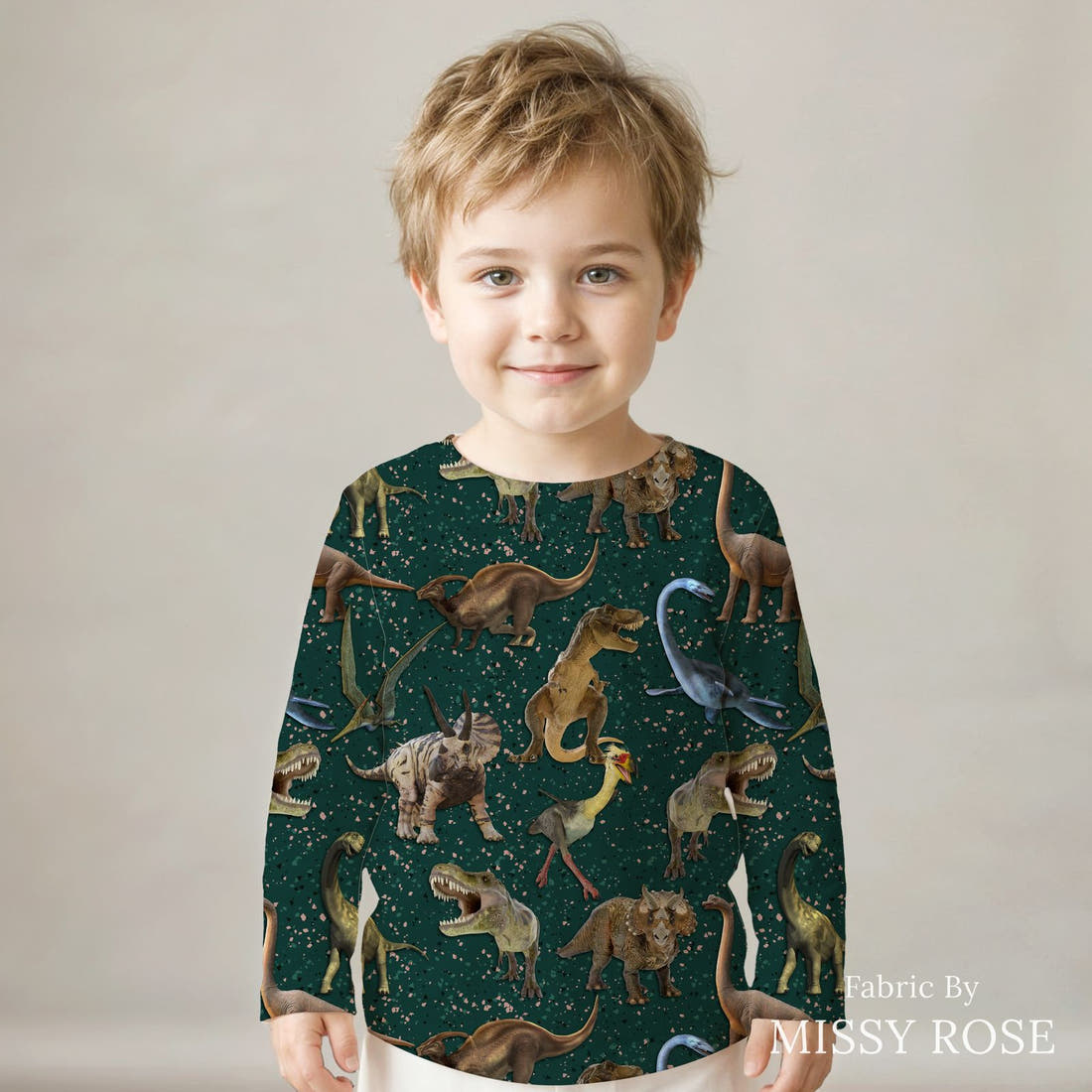 Design 129 Green Dinosaur Fabric sewn into a kids' long sleeve top – see how the print looks made up | Fabric by Missy Rose