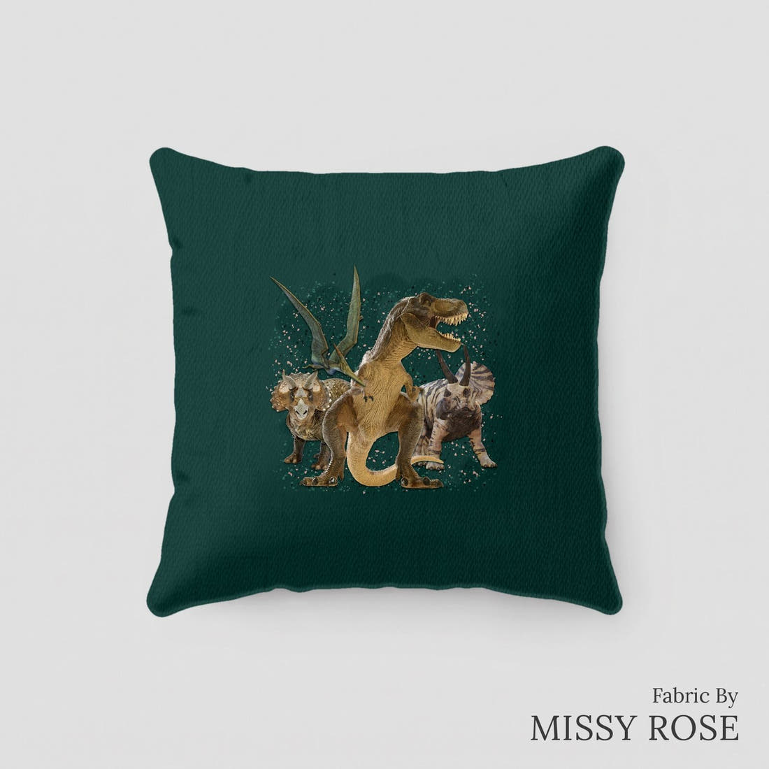 Design 129 Green Dinosaur Panel sewn into a cushion – see how the panel looks made up | Fabric by Missy Rose