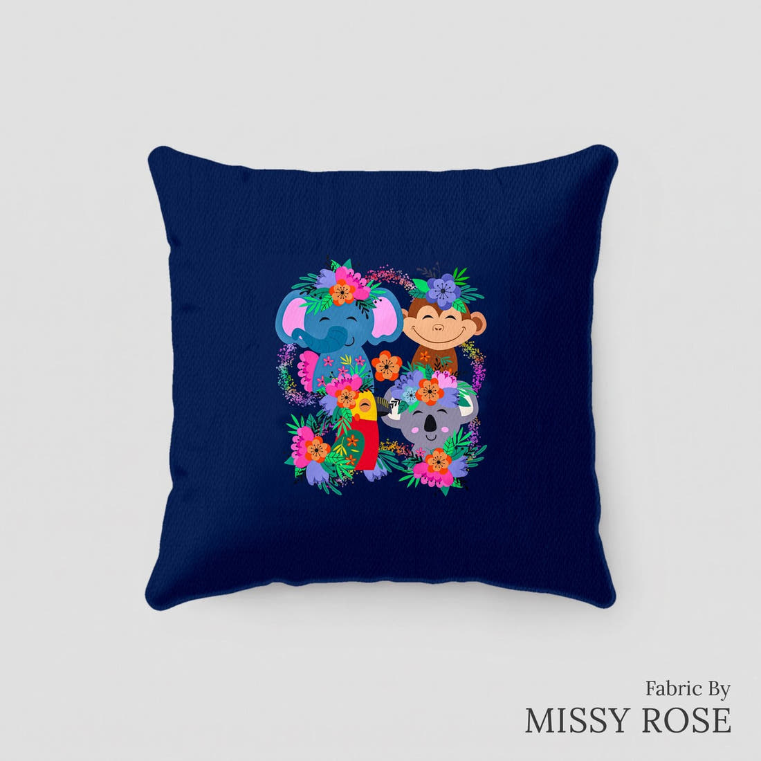 Design 131 Navy Jungle Animals Panel sewn into a cushion – see how the panel looks made up | Fabric by Missy Rose