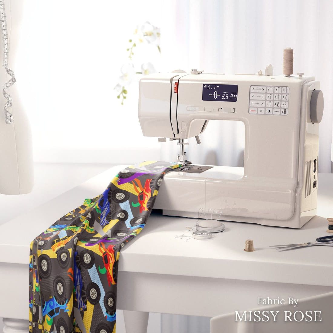 Design 137 Grey Monster Truck Fabric on a sewing machine – premium fabric for sewing projects | Fabric by Missy Rose