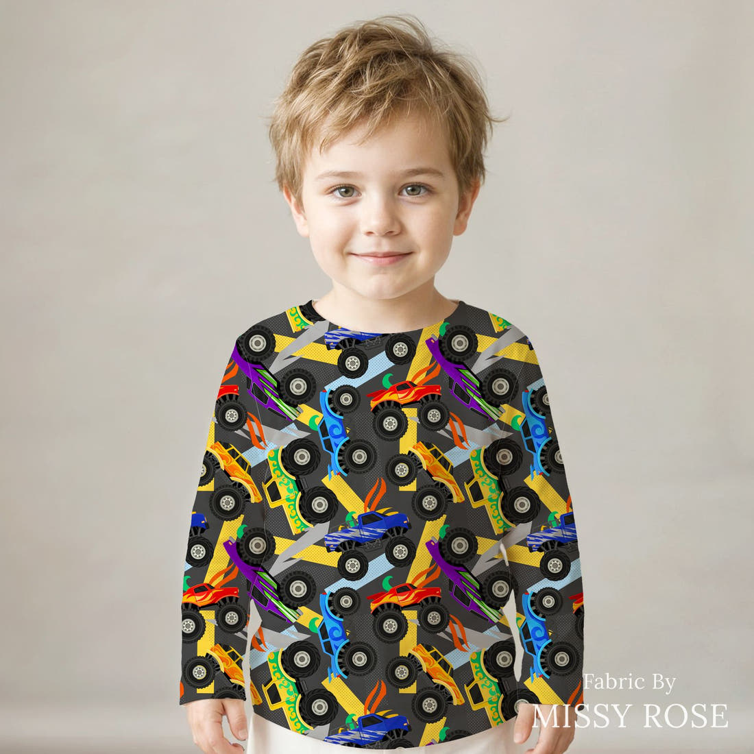 Design 137 Grey Monster Truck Fabric sewn into a kids' long sleeve top – see how the print looks made up | Fabric by Missy Rose