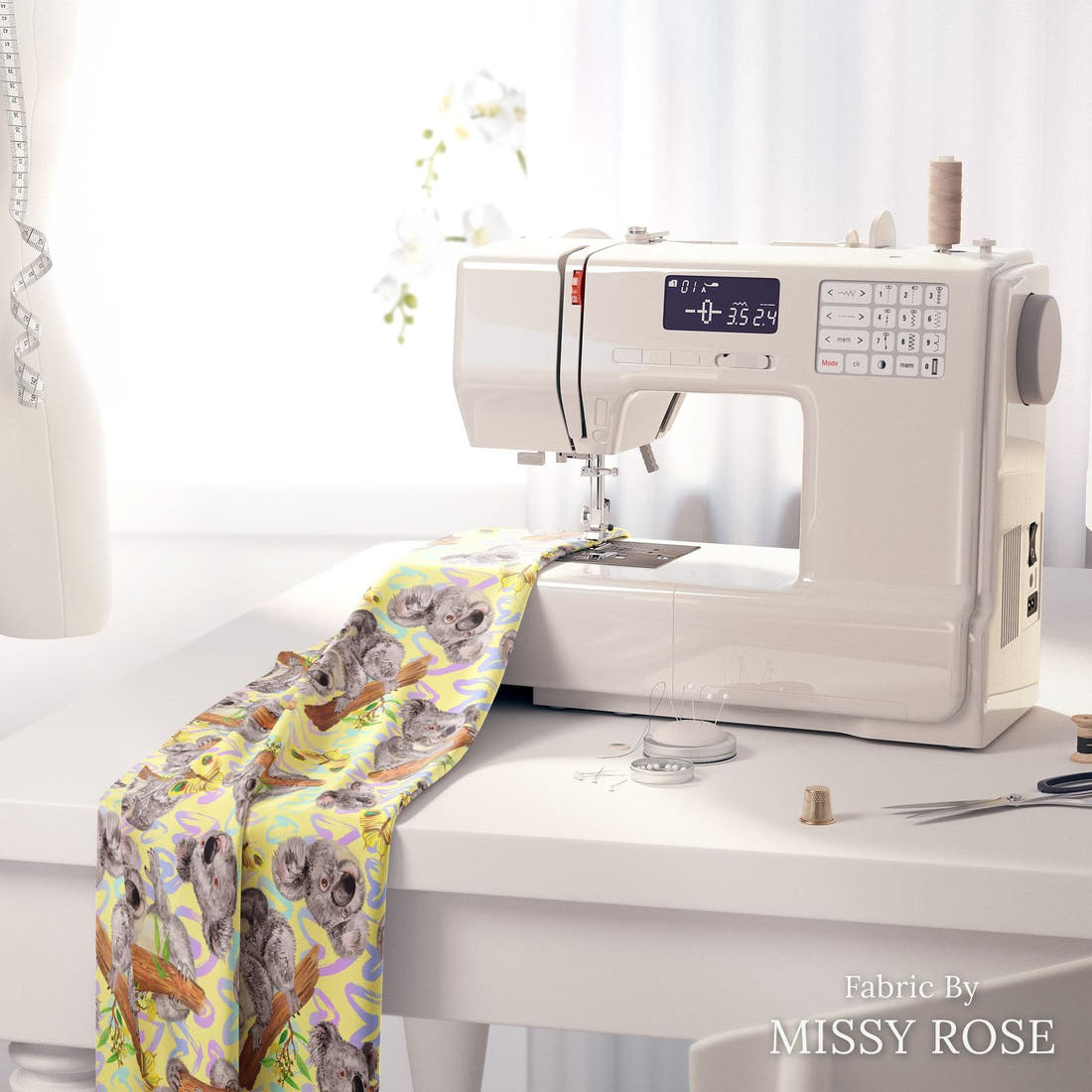 Design 15 Yellow Koala Fabric on a sewing machine – premium fabric for sewing projects | Fabric by Missy Rose