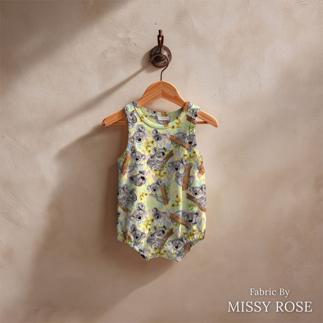Design 15 Yellow Koala Fabric sewn into a baby romper – see how the print looks made up | Fabric by Missy Rose