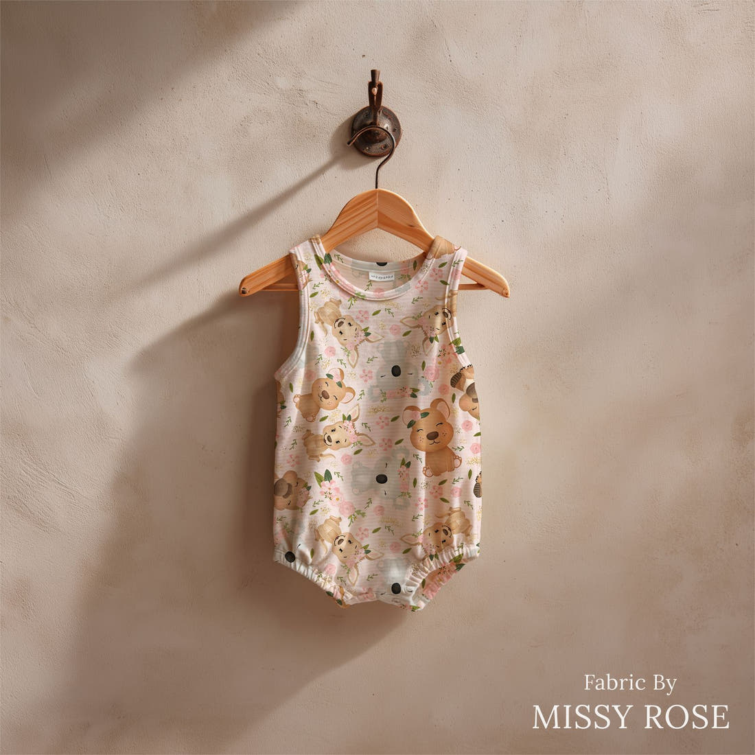 Design 152 Pink Cute Australian Animals Fabric sewn into a baby romper – see how the print looks made up | Fabric by Missy Rose