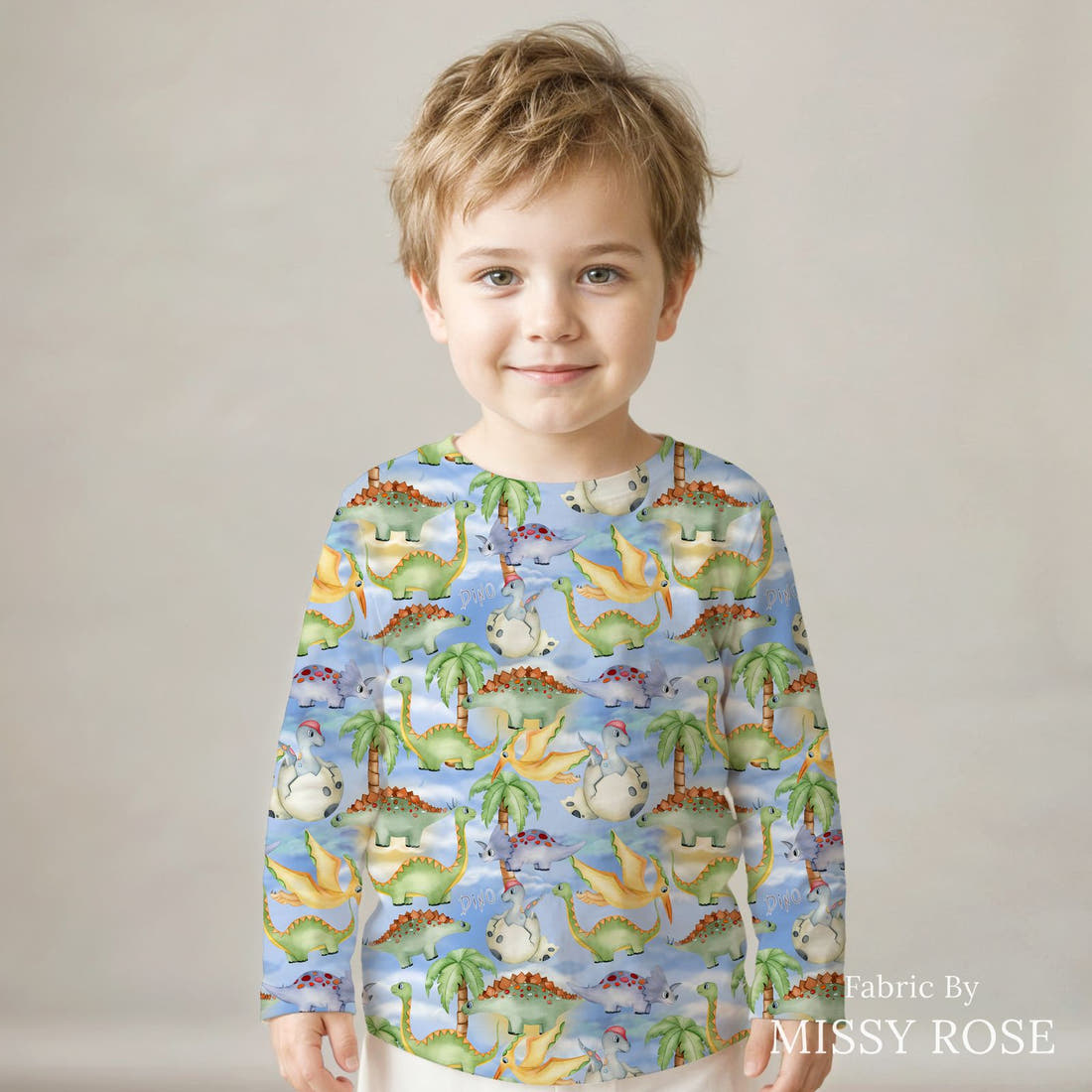 Design 155 Birthday Dinosaur Fabric sewn into a kids' long sleeve top – see how the print looks made up | Fabric by Missy Rose