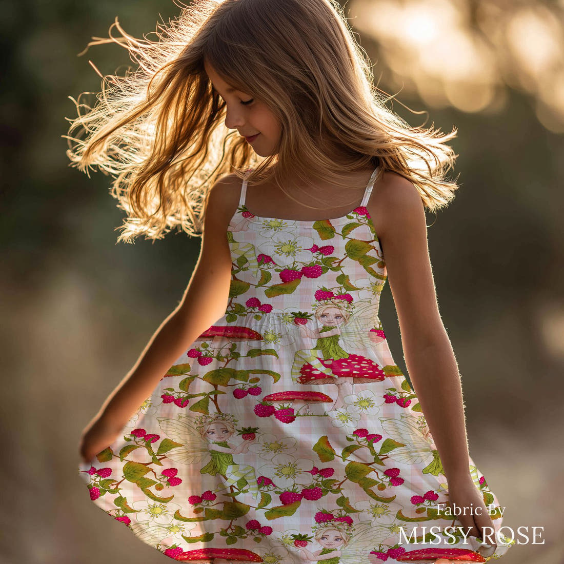 Design 156 Sweet Fairy Fabric sewn into a girls' dress – see how the print looks made up | Fabric by Missy Rose