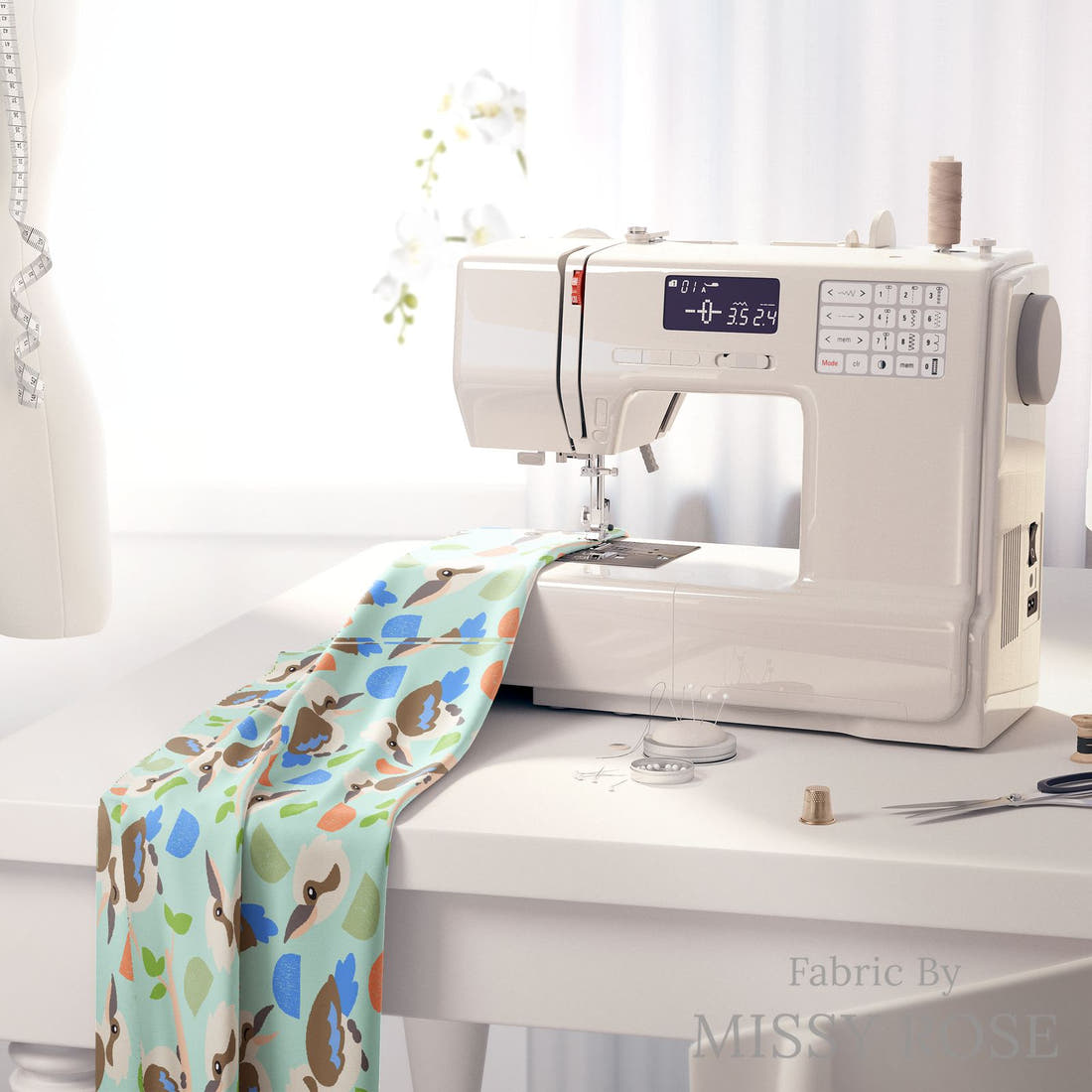 Design 16 Kookaburra Fabric on a sewing machine – premium fabric for sewing projects | Fabric by Missy Rose