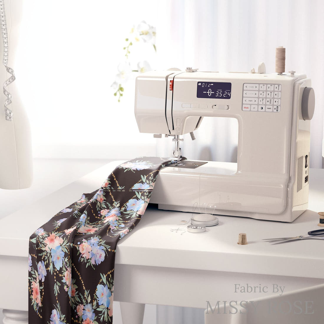 Design 160 Black and Blue Floral on a sewing machine – premium fabric for sewing projects | Fabric by Missy Rose