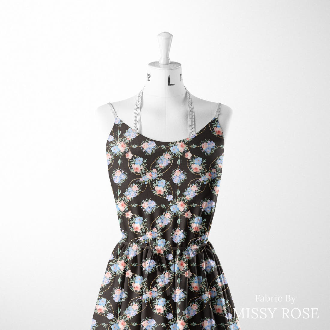 Design 160 Black and Blue Floral sewn into a women's dress – see how the print looks made up | Fabric by Missy Rose