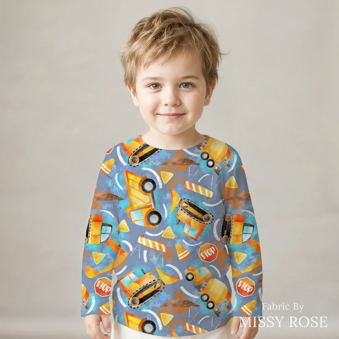 Design 162 Construction Fabric sewn into a kids' long sleeve top – see how the print looks made up | Fabric by Missy Rose