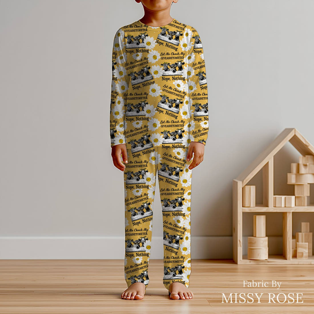 Design 164 Cow Fabric sewn into kids' pyjamas – see how the print looks made up | Fabric by Missy Rose