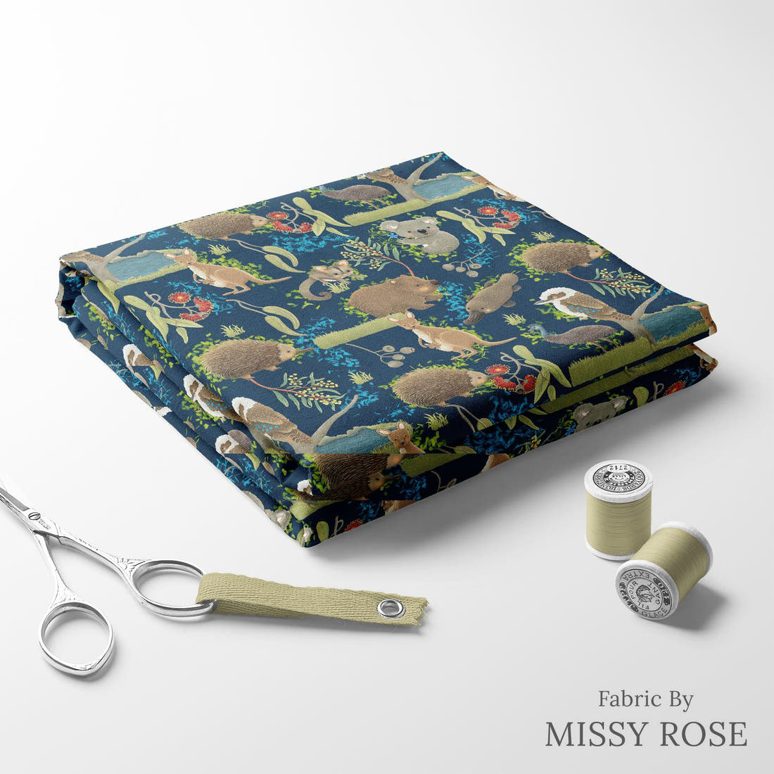 Design 172 Navy Australian Animal Fabric folded fabric stack with matching thread – pre-order fabric Australia | Fabric by Missy Rose