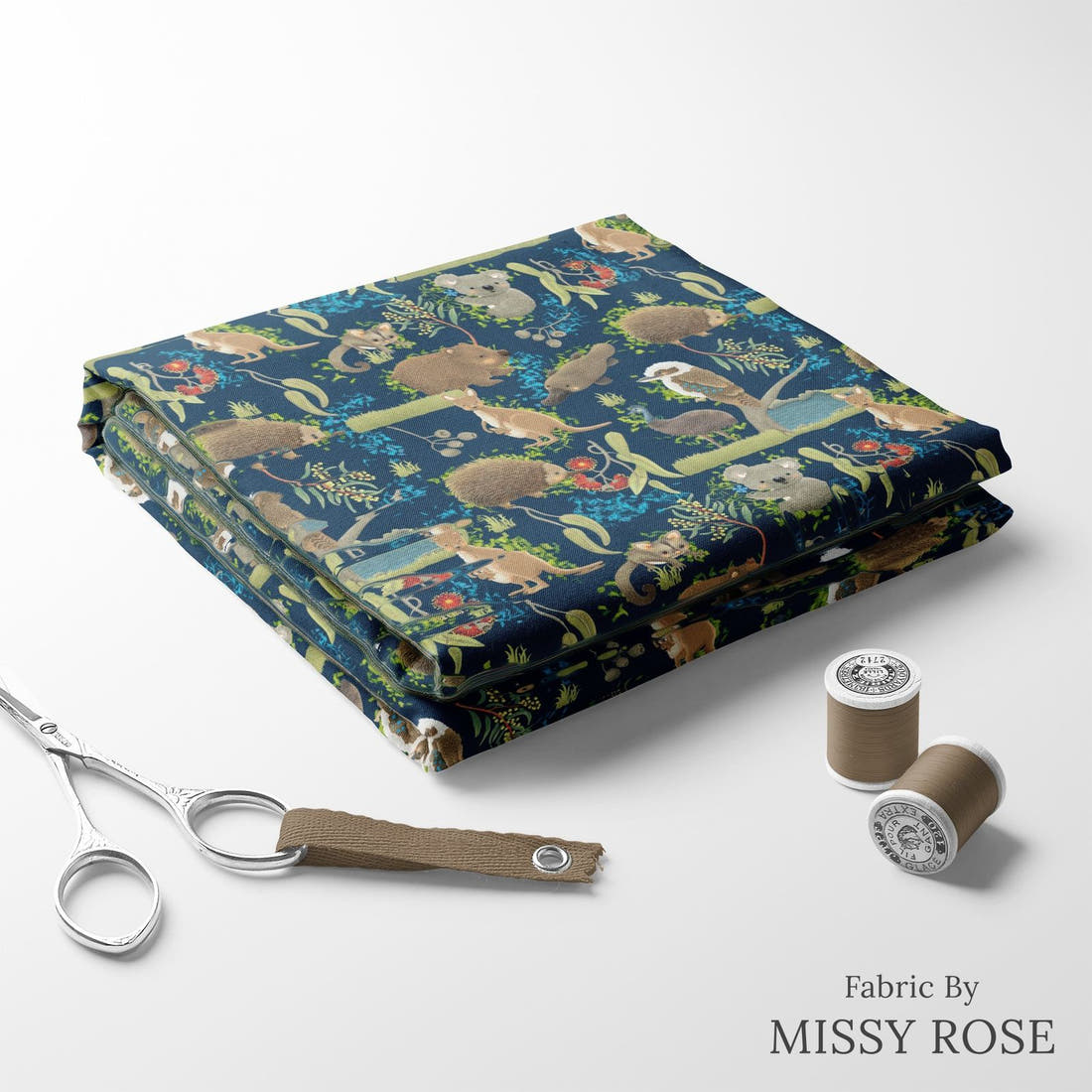 Design 172 Navy Australian Animal Fabric folded fabric stack with matching thread – pre-order fabric Australia | Fabric by Missy Rose