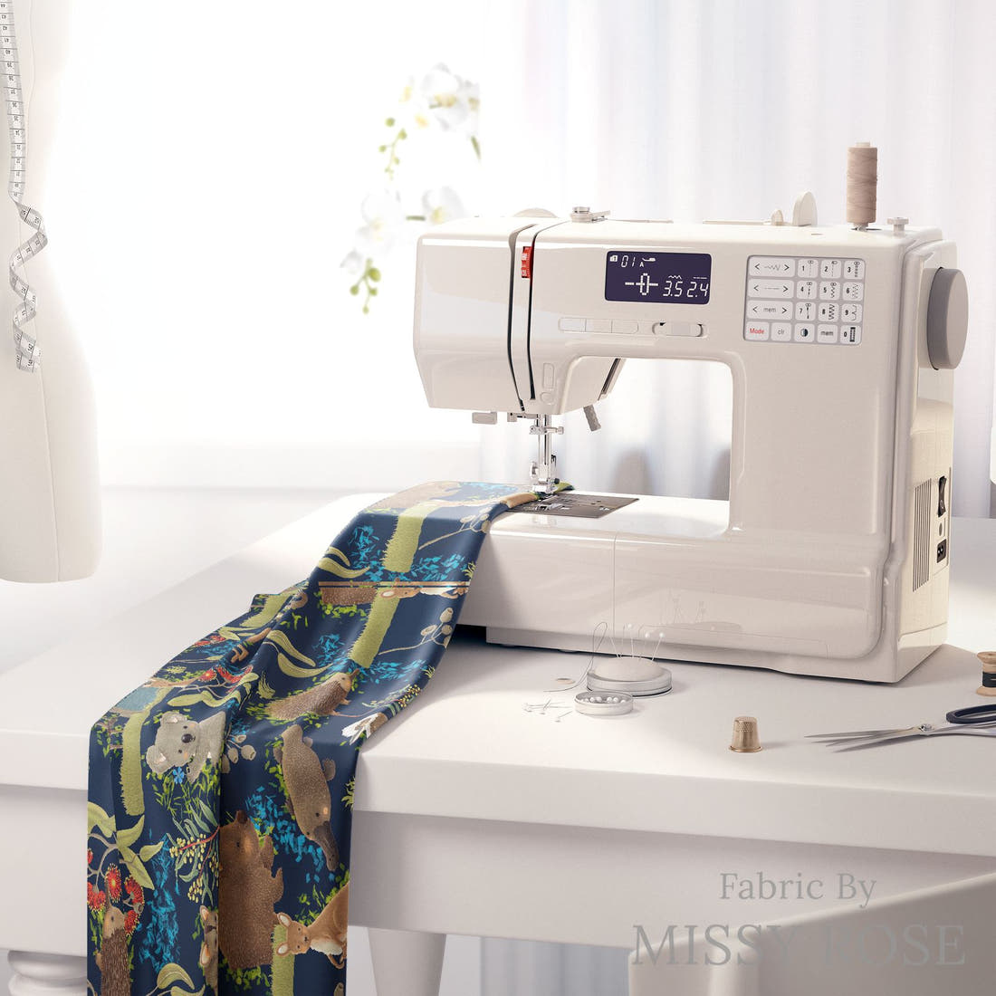 Design 172 Navy Australian Animal Fabric on a sewing machine – premium fabric for sewing projects | Fabric by Missy Rose