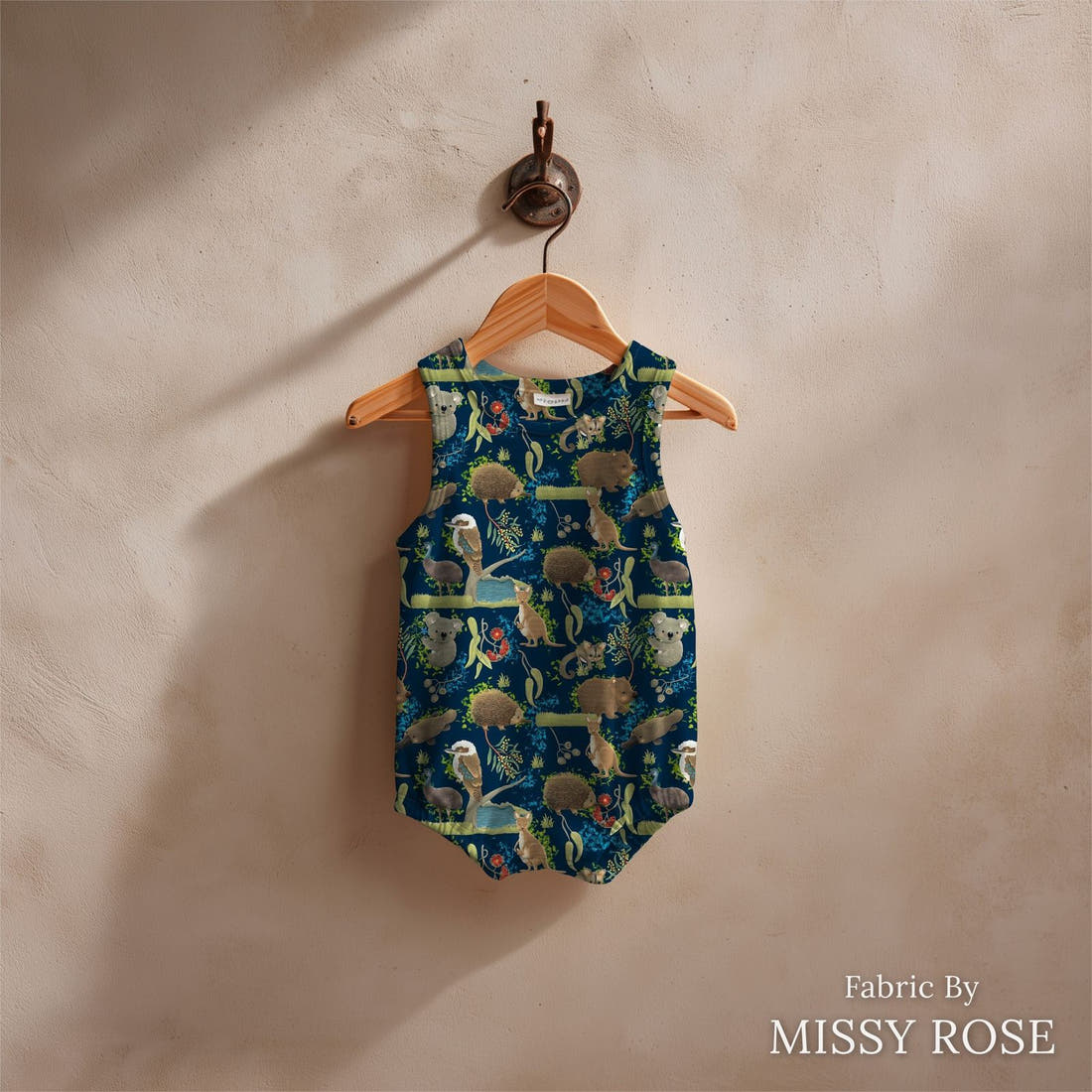 Design 172 Navy Australian Animal Fabric sewn into a baby romper – see how the print looks made up | Fabric by Missy Rose