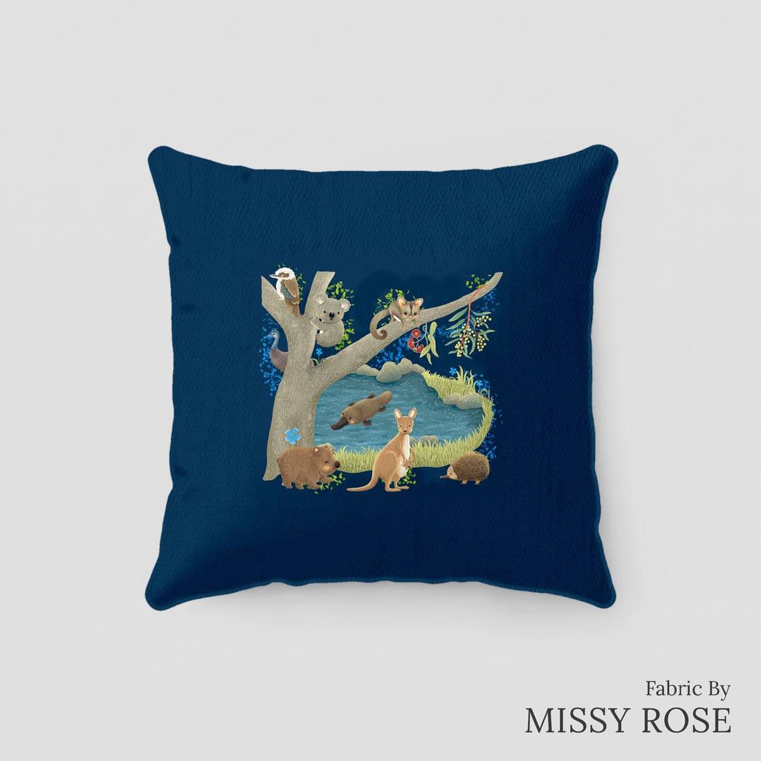 Design 172 Navy Australian Animal Panel sewn into a cushion – see how the panel looks made up | Fabric by Missy Rose