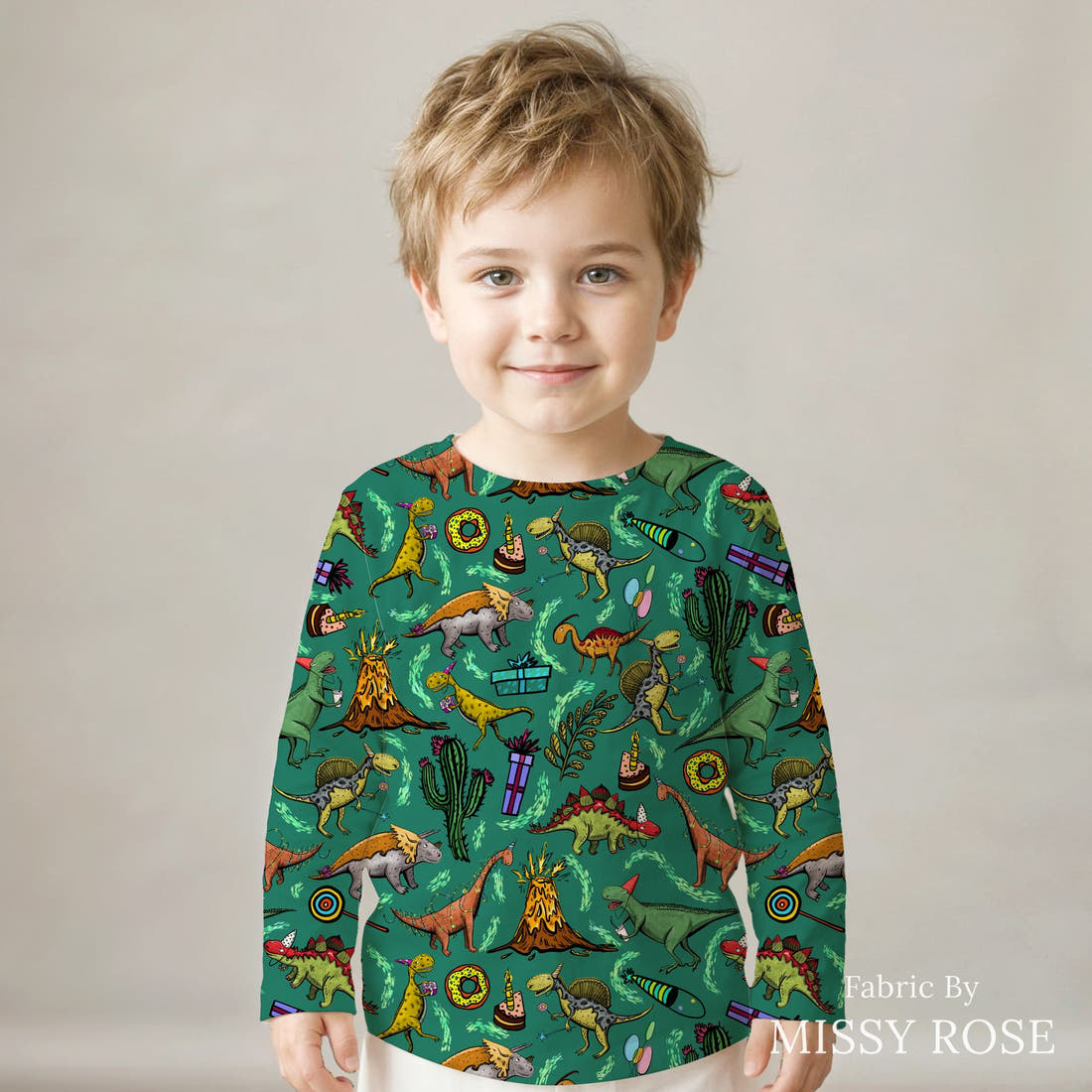 Design 177 Birthday Dinosaur Fabric sewn into a kids' long sleeve top – see how the print looks made up | Fabric by Missy Rose