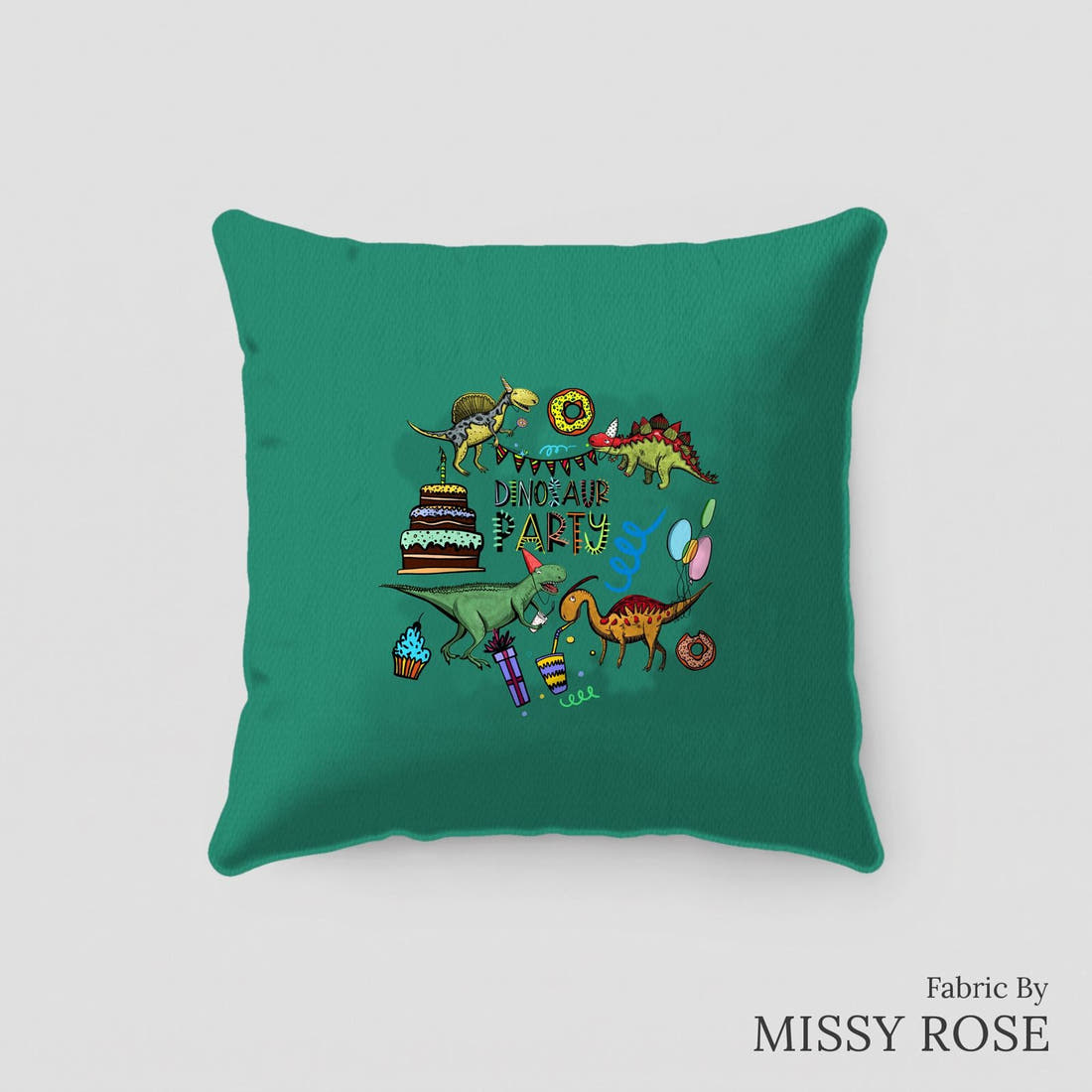 Design 177 Birthday Dinosaur Panel sewn into a cushion – see how the panel looks made up | Fabric by Missy Rose