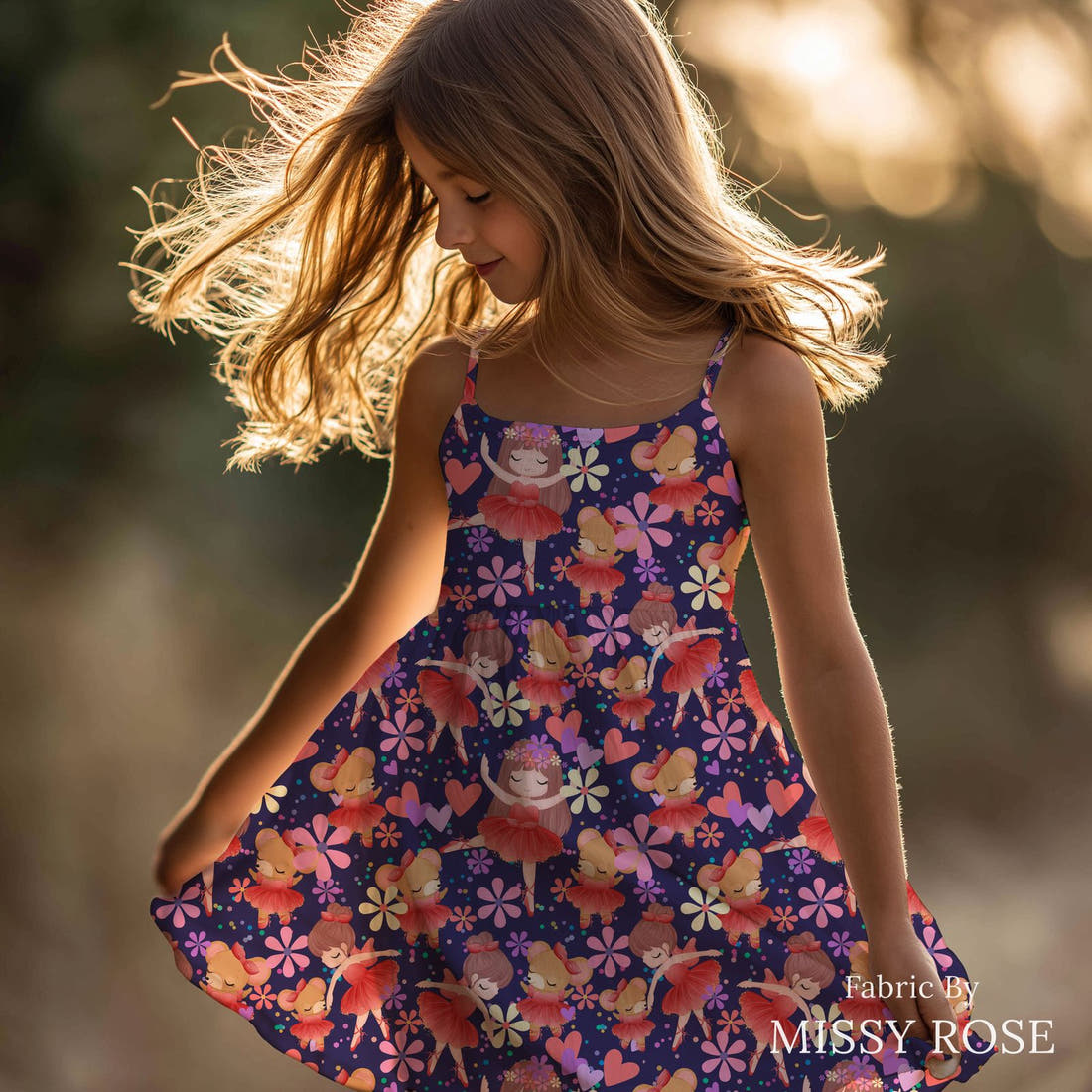 Design 186 Navy Ballerina Fabric sewn into a girls' dress – see how the print looks made up | Fabric by Missy Rose