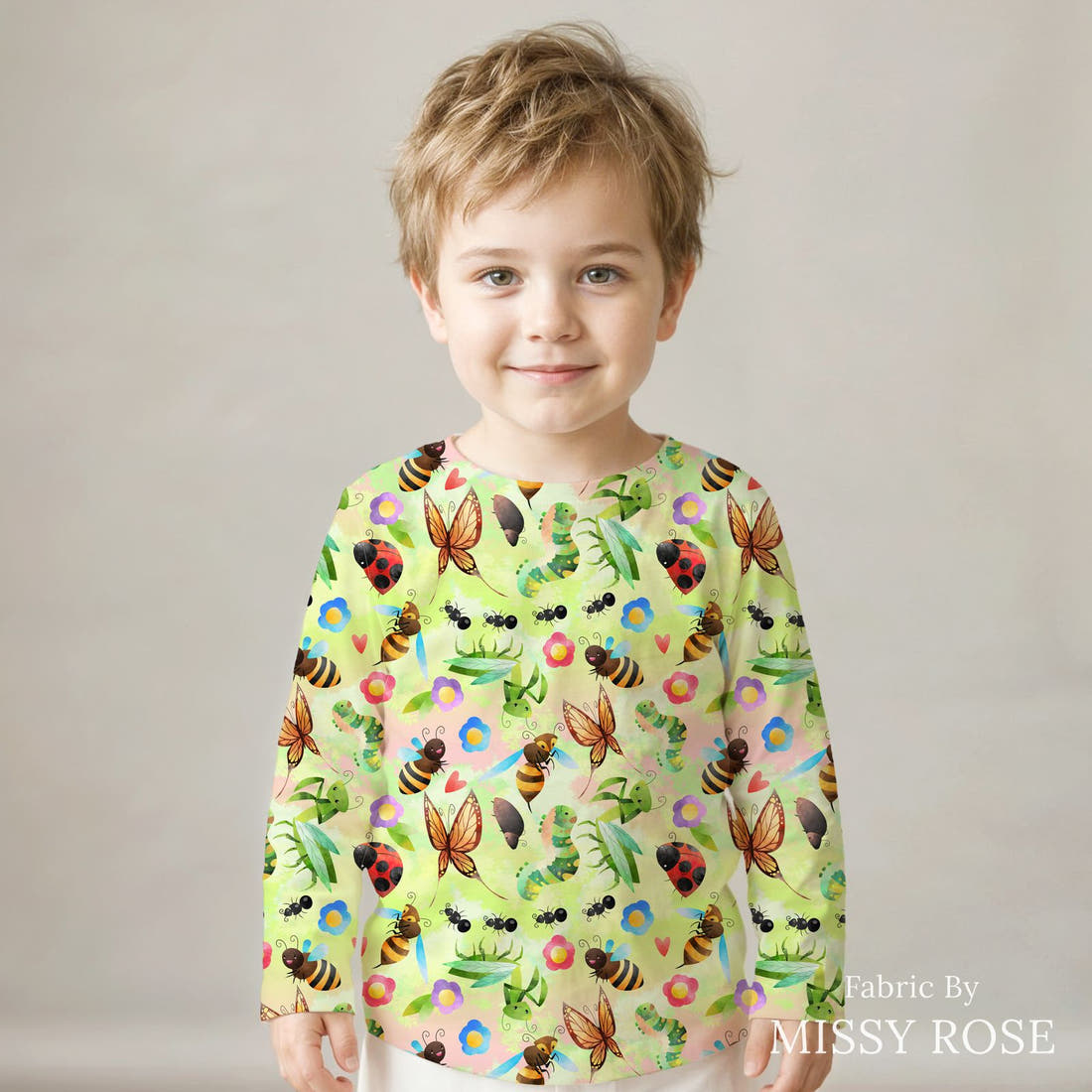 Design 190 Green Bugs Fabric sewn into a kids' long sleeve top – see how the print looks made up | Fabric by Missy Rose
