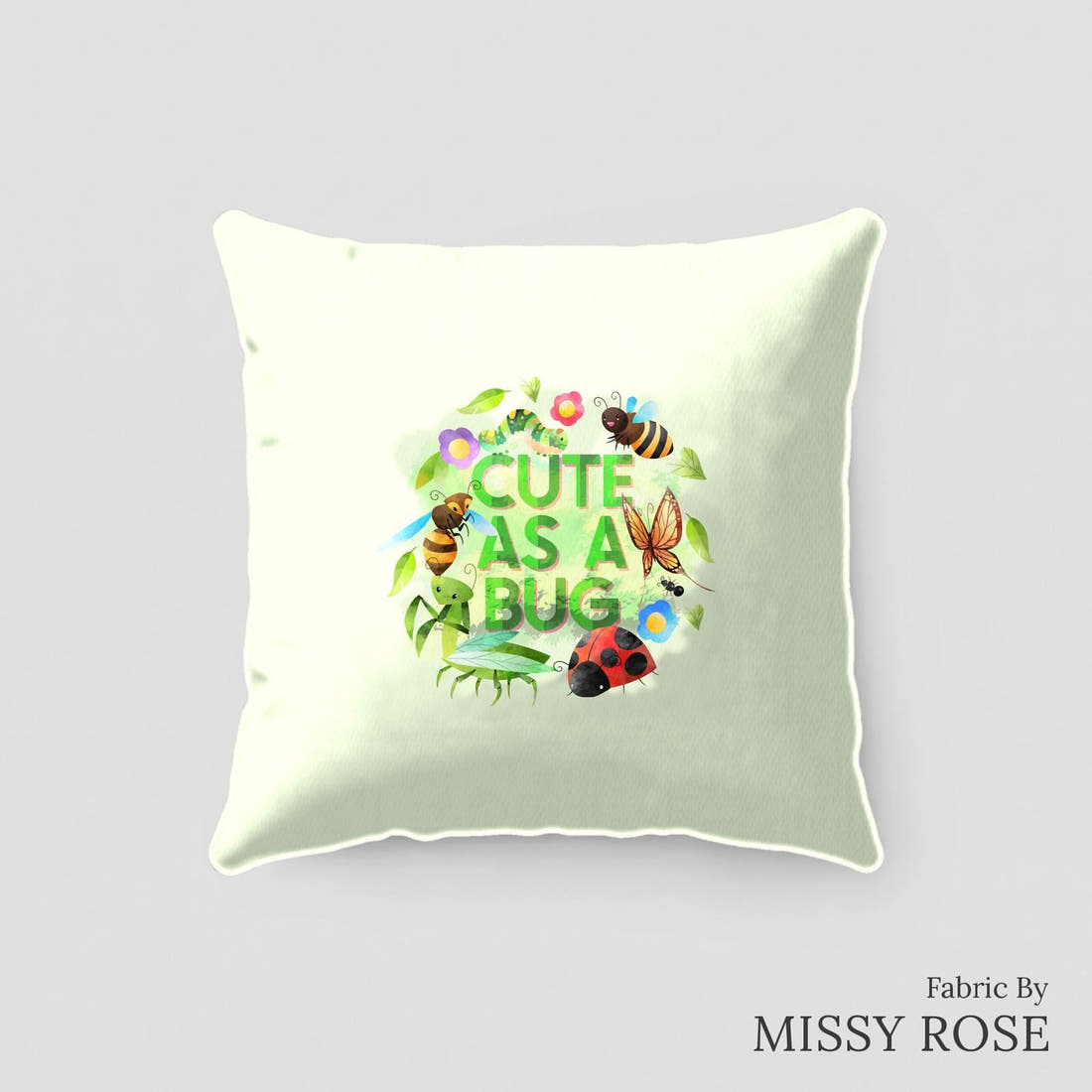 Design 190 Green Bugs Panel sewn into a cushion – see how the panel looks made up | Fabric by Missy Rose