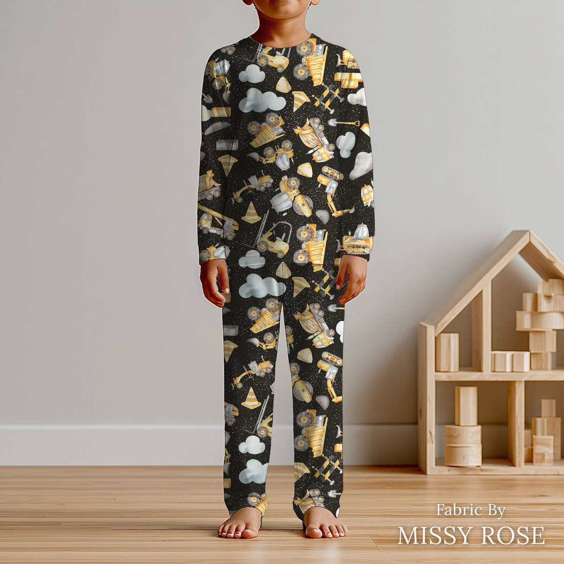 Design 192 Black Construction Fabric sewn into kids' pyjamas – see how the print looks made up | Fabric by Missy Rose
